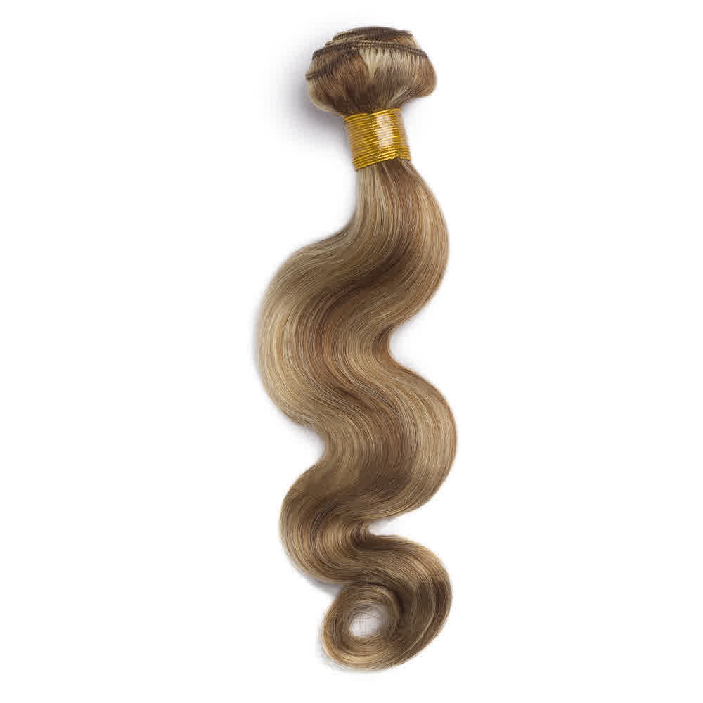 A bundle of wavy, light brown hair extensions with a golden band.