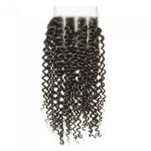Three bundles of curly hair extensions with a lace closure.